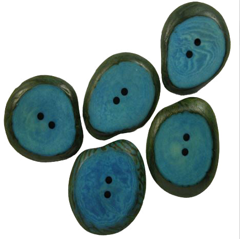 Turquoise hand dyed tagua nut buttons also known as vegetable ivory fair trade imported from Ecuador.