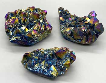 A flat of crystal druse clusters with rainbow metallic coloring