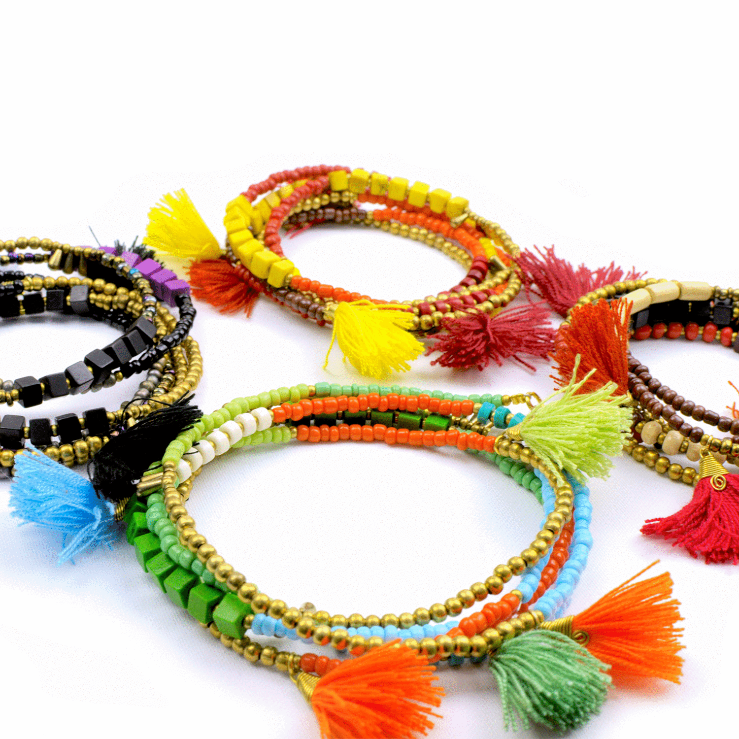 colorful handmade bead and tassel wrap bracelets made by female artisans in Nepal and fair trade imported by www.lowcountryfairtrade.com