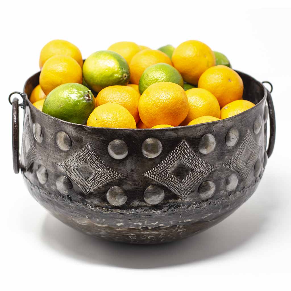 Hand-Crafted Metal decorative fruit bowl or drink cooler created by artisans in Haiti who recycle 55-gallon steel drums to create their metal art. Fair trade.