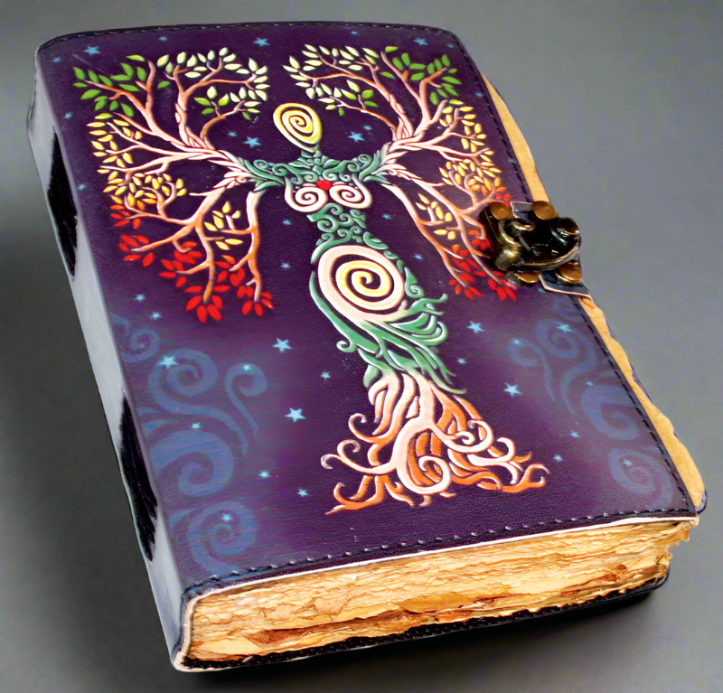 Colorful Goddess tree of life hand-tooled leather journal with aged looking blank pages and metal latch