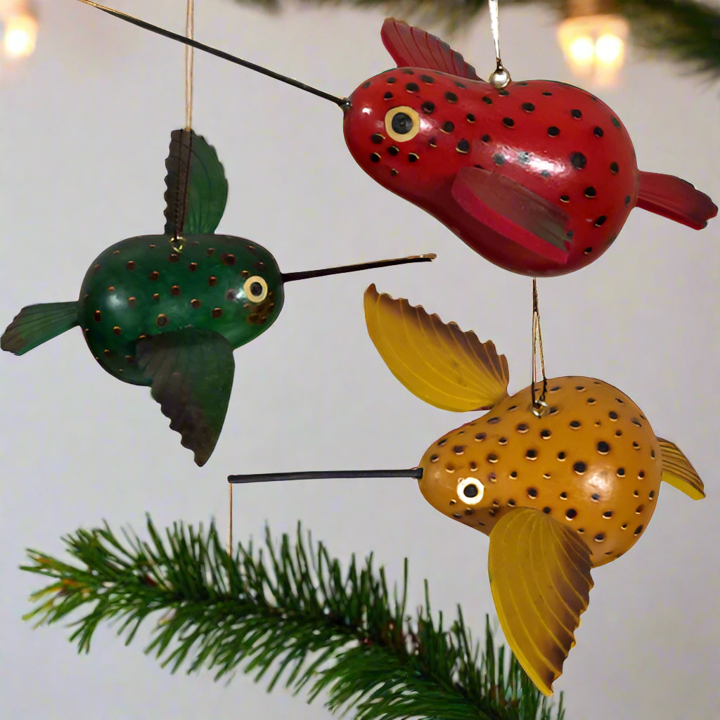 hand-carved and hand-painted gourd hummingbird decorative ornaments available in red, green, or yellow.