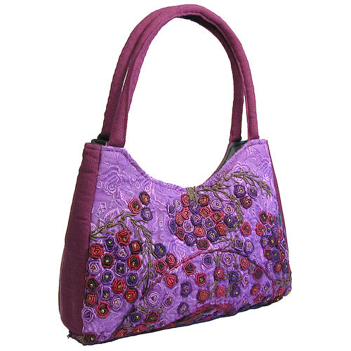 <center> Rococo Handbag made in Guatemala - Purple Luna<br> Measures 12" wide x 10" high</center>