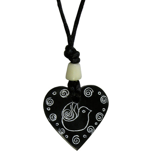 <center>Coal Heat Pendant with Dove </br>Crafted by Artisans in Colombia </br>Measures 1-1/2” in height, 1-1/2" in width, and 1/4” thick</center>