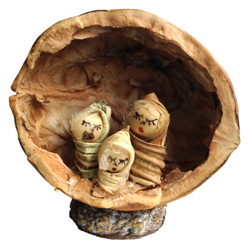 <center>Mini Walnut Nativity</br>handmade in Ecuador by artisans at Camari<br/>Measures 1" tall x 1-1/4" wide x 1-1/2" diameter</center>