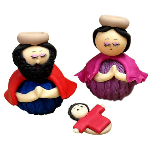 <center>3 Piece Marzipan Nativity with Walnut Base<br>handmade in Ecuador by artisans at Camari<br>Joseph Measures 2 1/2" tall x 2 1/4" wide x 2 1/8" diameter<center/>