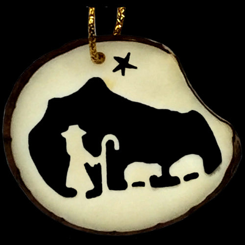 <center>Tagua Nut Shepard by Night Ornament Slice</br>from Ecuador </br>Average Measurement - 1 3\8" high x 1 5/8" wide x 1/8" thick</center>