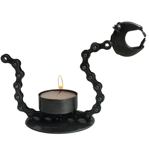 <center>Junkyard Snake Tea Light Crafted by Artisans in India<br/>Measures 4-1/4" high x 6-1/4" long x 3" wide</center>