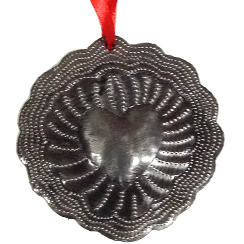 <center>Upcycled Metal Heart Ornament</br>Measures - 4" high x 4" wide<br/>Handmade from Metal Drums in Haiti</center>