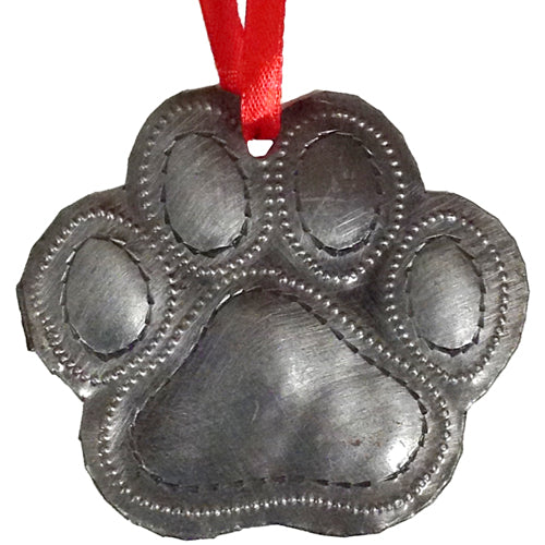 <center>Upcycled Metal Paw Ornament</br>Measures - 2-3/4" high x 3-1/4" wide<br/>Handmade from Metal Drums in Haiti</center>