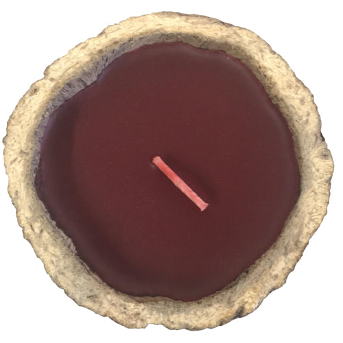 <center>Brazil Nut Pod Candle with Red Wine Scent Crafted in Peru </br>Measures: ~ 2-1/4" to 2-3/4” high and 4” to 4-1/2” in diameter </br> 