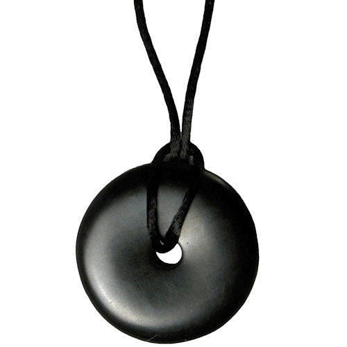 <center>Donut Shaped Coal Pendant </br>Crafted by Artisans in Colombia </br>Measures 1-1/4” in diameter x 1/4” deep</center>