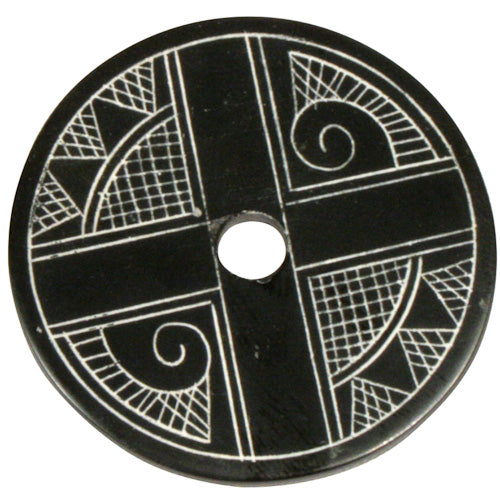 <center>Coal Pendant with Muisca Scroll #4 </br>Crafted by Artisans in Colombia </br>Measures 1-3/4” diameter and 1/8” thick</center>