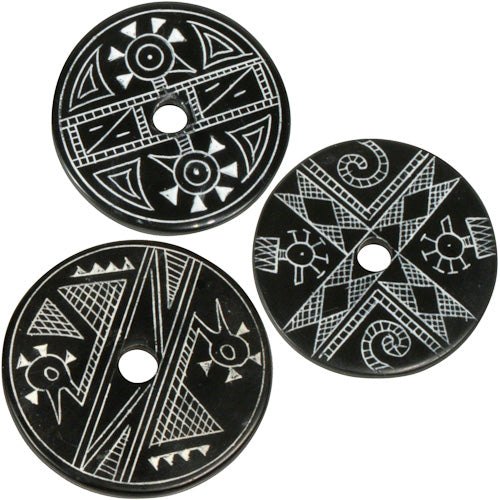 <center>Coal Pendants with Duck Designs </br>Crafted by Artisans in Colombia </br>Measure 1-3/4” diameter and 1/8” thick</center>