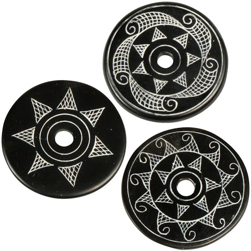 <center>Coal Pendants with Sun Designs </br>Crafted by Artisans in Colombia </br>Measure 1-3/4” diameter and 1/8” thick</center>