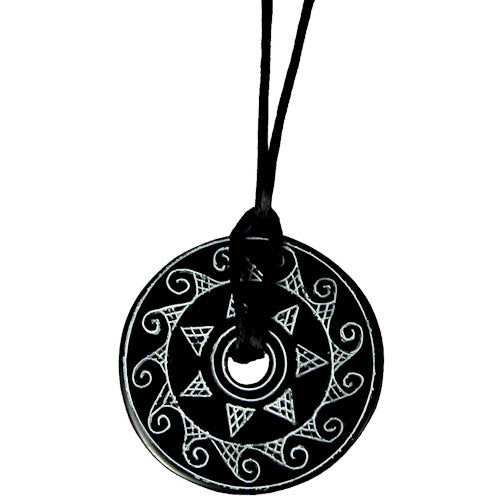 <center>Coal Pendant with Sun Design #3 </br>Crafted by Artisans in Colombia </br>Measures 1-3/4” diameter and 1/8” thick</center>