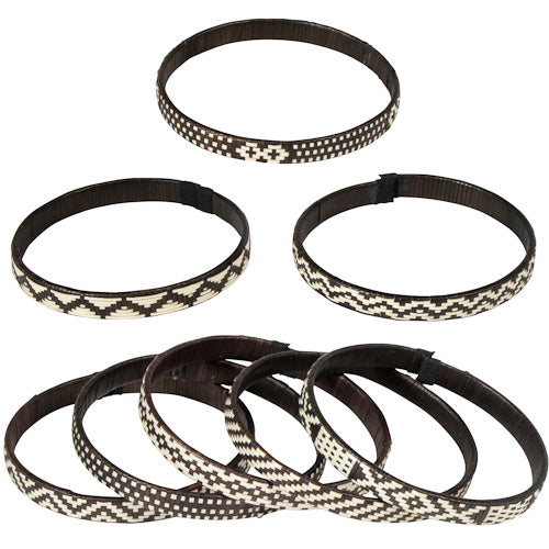 <center>Narrow, Black and White Caña Flecha Bracelets </br>Crafted by Artisans in Colombia </br>Measure 1/4” wide with variable diameter</center>