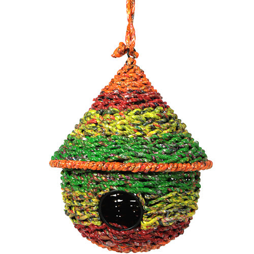 <center>Recycled Candy Wrapper Birdhouse </br>Crafted by Artisans in India </br>Measures 9" high x 8" diameter</center>