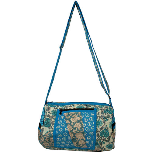 <center>Blue Tone Patchwork Round Bag </br>Crafted by Artisans in India </br>Measures 12-1/2” long x 8-1/2” diameter</center>