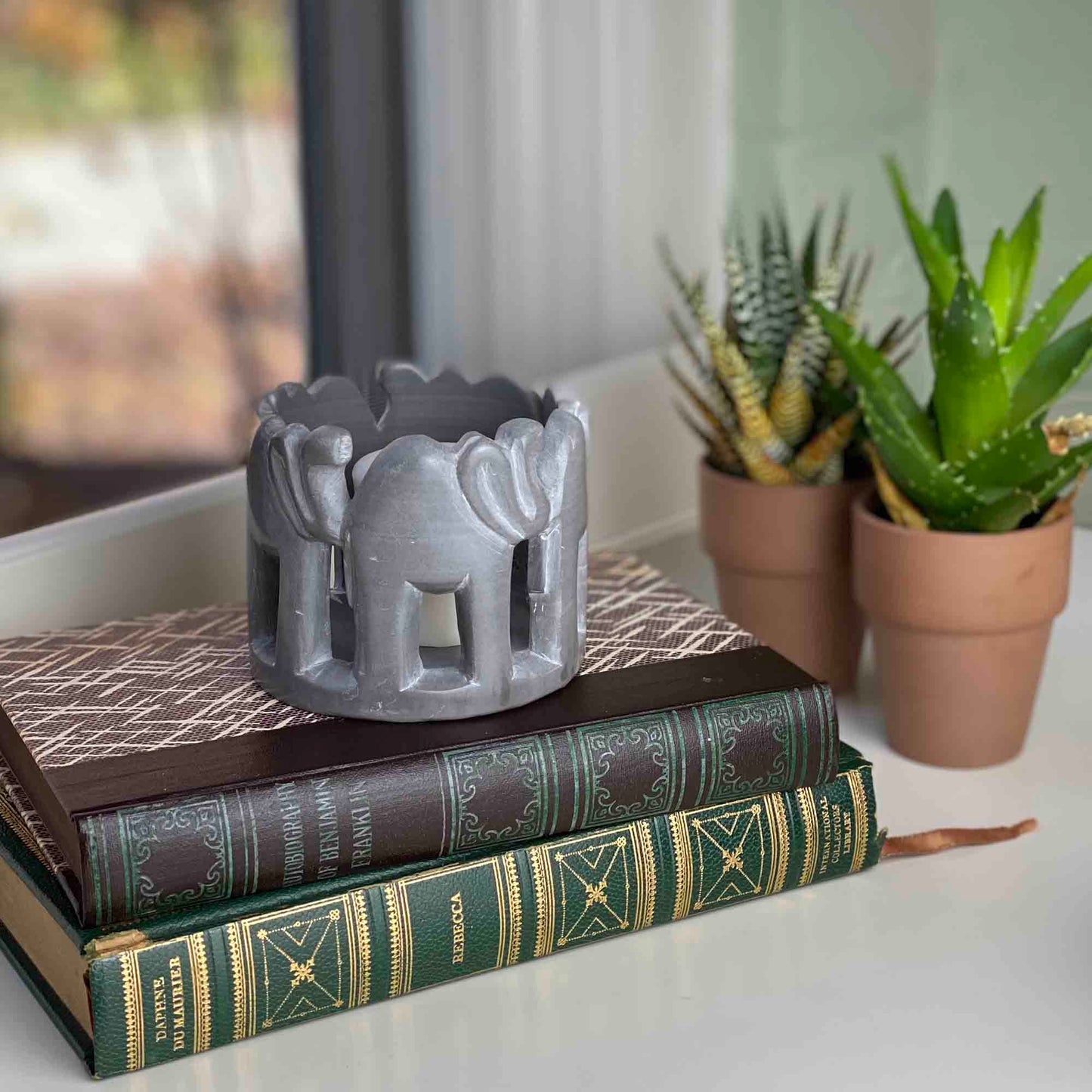 Circle of Elephants Hand-Carve Soapstone Sculpture 3 to 3.5-inch - Dark Stone